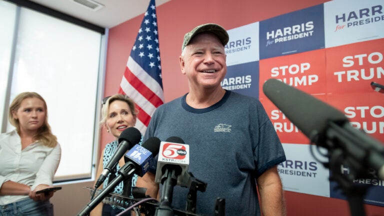Gov. Tim Walz of Minnesota speaks to reporters at a canvassing event for the Democratic presidential ticket in St. Paul, Minn.
