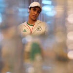 Algerian boxer Imane Khelif speaks during an interview with SNTV at the 2024 Summer Olympics.