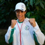 Algerian boxer Imane Khelif poses for a photo after an interview with SNTV at the 2024 Summer Olympics.