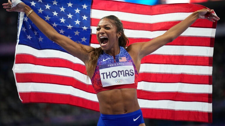Gabrielle Thomas, of the United States, reacts after winning the women's 200-meters final at the 2024 Summer Olympics, Tuesday, Aug. 6, 2024, in Saint-Denis, France.