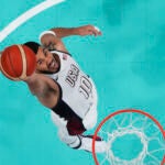 Jayson Tatum, of the United States, grabs a rebound against South Sudan at the 2024 Summer Olympics.