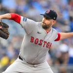 Red Sox starting pitcher James Paxton throws to a Kansas City Royals batter during the first inning.