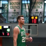 Gordon Hayward is pictured as he walks across the floor following a photo shoot.