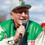 Boston Celtics legend Bob Cousy on the public address anouncing, “Play Ball,” during opening day ceremonies for the WooSox at Polar Park.