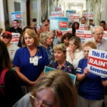 State Senator Jamie Eldridge and State Senator Nick Collins invited concerned residents, caregivers and public officials for a visit to the State House to save Carney Hospital and Nashoba Valley Medical Center.